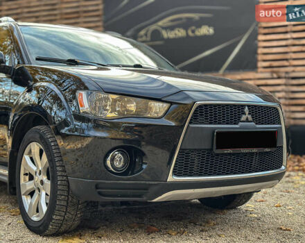 Черный Мицубиси Аутлендер, объемом двигателя 2.2 л и пробегом 226 тыс. км за 11500 $, фото 24 на Automoto.ua