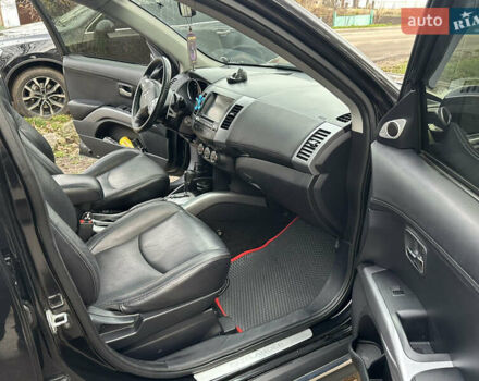 Чорний Міцубісі Аутлендер, об'ємом двигуна 2.36 л та пробігом 197 тис. км за 11300 $, фото 13 на Automoto.ua