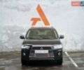 Черный Мицубиси Аутлендер, объемом двигателя 2.36 л и пробегом 107 тыс. км за 13990 $, фото 1 на Automoto.ua