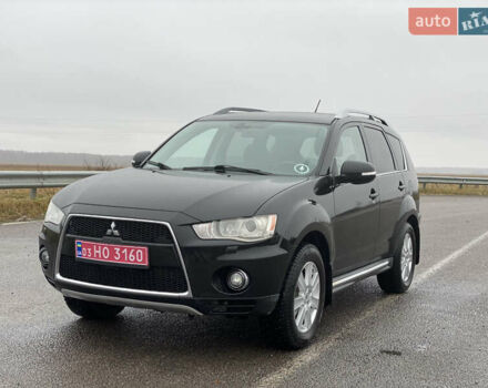 Черный Мицубиси Аутлендер, объемом двигателя 2.2 л и пробегом 227 тыс. км за 10700 $, фото 2 на Automoto.ua