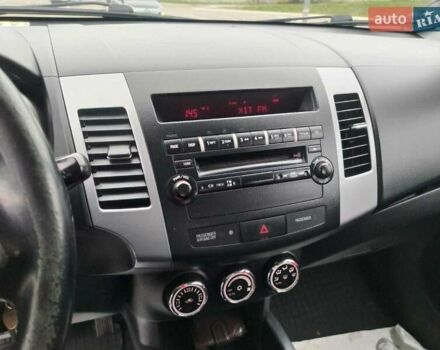 Чорний Міцубісі Аутлендер, об'ємом двигуна 2 л та пробігом 226 тис. км за 10750 $, фото 12 на Automoto.ua