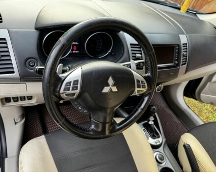 Черный Мицубиси Аутлендер, объемом двигателя 2.2 л и пробегом 249 тыс. км за 11500 $, фото 2 на Automoto.ua