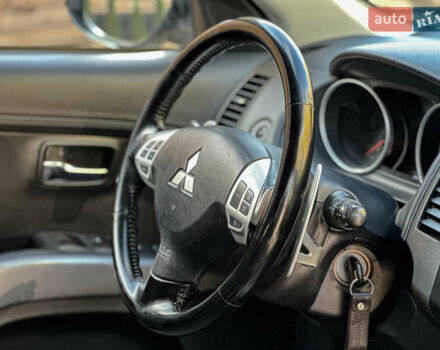 Черный Мицубиси Аутлендер, объемом двигателя 2.2 л и пробегом 226 тыс. км за 11500 $, фото 101 на Automoto.ua