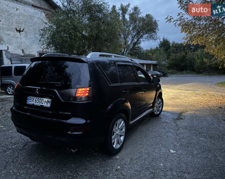 Чорний Міцубісі Аутлендер, об'ємом двигуна 2 л та пробігом 258 тис. км за 8699 $, фото 16 на Automoto.ua