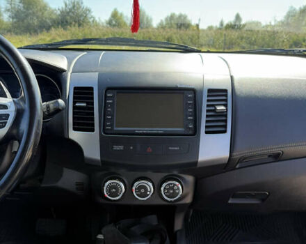 Чорний Міцубісі Аутлендер, об'ємом двигуна 2.36 л та пробігом 235 тис. км за 12500 $, фото 12 на Automoto.ua