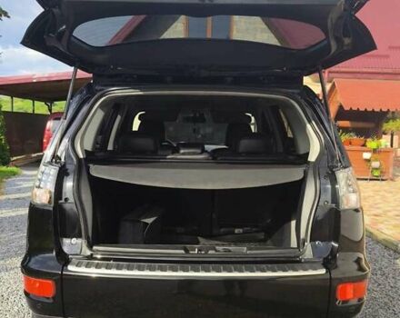 Чорний Міцубісі Аутлендер, об'ємом двигуна 1.97 л та пробігом 282 тис. км за 10900 $, фото 9 на Automoto.ua