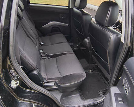 Черный Мицубиси Аутлендер, объемом двигателя 2.27 л и пробегом 238 тыс. км за 11500 $, фото 2 на Automoto.ua