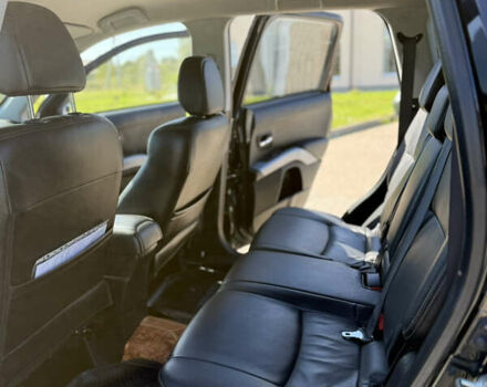 Чорний Міцубісі Аутлендер, об'ємом двигуна 2.36 л та пробігом 235 тис. км за 12500 $, фото 7 на Automoto.ua