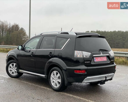 Черный Мицубиси Аутлендер, объемом двигателя 2.2 л и пробегом 227 тыс. км за 10700 $, фото 13 на Automoto.ua