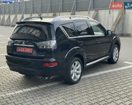 Черный Мицубиси Аутлендер, объемом двигателя 2.2 л и пробегом 225 тыс. км за 10950 $, фото 16 на Automoto.ua