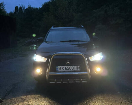 Чорний Міцубісі Аутлендер, об'ємом двигуна 2 л та пробігом 258 тис. км за 8699 $, фото 13 на Automoto.ua