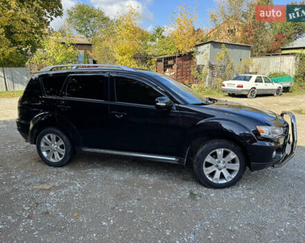 Чорний Міцубісі Аутлендер, об'ємом двигуна 2 л та пробігом 258 тис. км за 8699 $, фото 4 на Automoto.ua