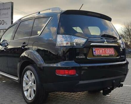 Черный Мицубиси Аутлендер, объемом двигателя 2 л и пробегом 210 тыс. км за 10600 $, фото 5 на Automoto.ua
