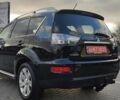 Черный Мицубиси Аутлендер, объемом двигателя 2 л и пробегом 210 тыс. км за 10600 $, фото 5 на Automoto.ua