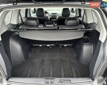 Чорний Міцубісі Аутлендер, об'ємом двигуна 2 л та пробігом 228 тис. км за 10550 $, фото 38 на Automoto.ua