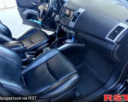 Черный Мицубиси Аутлендер, объемом двигателя 2 л и пробегом 224 тыс. км за 12300 $, фото 6 на Automoto.ua