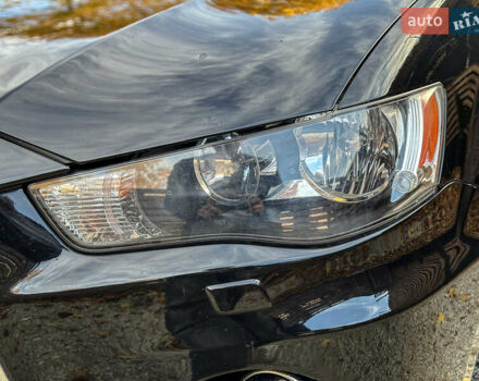 Черный Мицубиси Аутлендер, объемом двигателя 2.2 л и пробегом 226 тыс. км за 11500 $, фото 47 на Automoto.ua