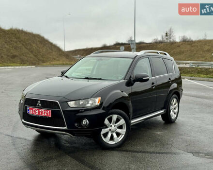 Чорний Міцубісі Аутлендер, об'ємом двигуна 2 л та пробігом 228 тис. км за 10550 $, фото 2 на Automoto.ua