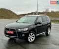 Чорний Міцубісі Аутлендер, об'ємом двигуна 2 л та пробігом 228 тис. км за 10550 $, фото 2 на Automoto.ua