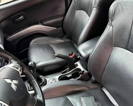 Чорний Міцубісі Аутлендер, об'ємом двигуна 2 л та пробігом 210 тис. км за 10700 $, фото 3 на Automoto.ua