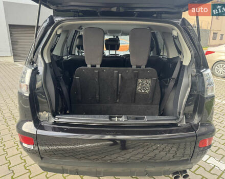 Черный Мицубиси Аутлендер, объемом двигателя 2.2 л и пробегом 225 тыс. км за 10950 $, фото 42 на Automoto.ua