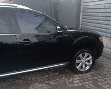 Черный Мицубиси Аутлендер, объемом двигателя 2.2 л и пробегом 264 тыс. км за 10700 $, фото 6 на Automoto.ua