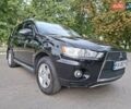 Мицубиси Аутлендер 2010 в Чернигове на Automoto.ua Черный Мицубиси Аутлендер, объемом двигателя 2.4 л и пробегом 180 тыс. км за 11500 $, фото 2 на Automoto.ua