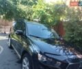 Черный Мицубиси Аутлендер, объемом двигателя 2.3 л и пробегом 230 тыс. км за 9300 $, фото 1 на Automoto.ua