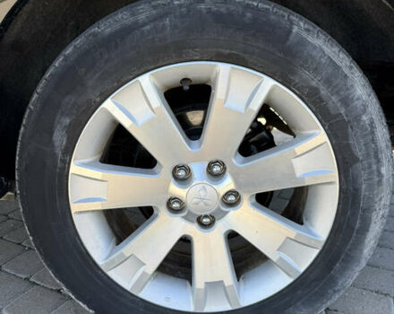 Чорний Міцубісі Аутлендер, об'ємом двигуна 2.36 л та пробігом 235 тис. км за 12500 $, фото 16 на Automoto.ua