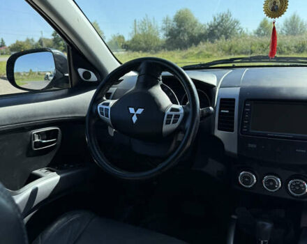 Чорний Міцубісі Аутлендер, об'ємом двигуна 2.36 л та пробігом 235 тис. км за 12500 $, фото 3 на Automoto.ua
