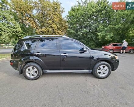 Мицубиси Аутлендер 2010 в Чернигове на Automoto.ua Черный Мицубиси Аутлендер, объемом двигателя 2.4 л и пробегом 180 тыс. км за 11500 $, фото 6 на Automoto.ua