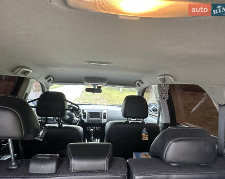 Черный Мицубиси Аутлендер, объемом двигателя 1.97 л и пробегом 224 тыс. км за 9000 $, фото 7 на Automoto.ua