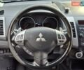 Мицубиси Аутлендер 2010 в Чернигове на Automoto.ua Черный Мицубиси Аутлендер, объемом двигателя 2.4 л и пробегом 180 тыс. км за 11500 $, фото 14 на Automoto.ua
