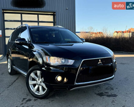 Черный Мицубиси Аутлендер, объемом двигателя 2.2 л и пробегом 263 тыс. км за 11300 $, фото 1 на Automoto.ua