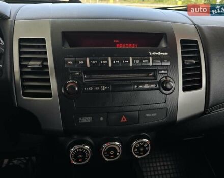 Мицубиси Аутлендер 2010 в Калуше на Automoto.ua Черный Мицубиси Аутлендер, объемом двигателя 1.97 л и пробегом 270 тыс. км за 11700 $, фото 30 на Automoto.ua