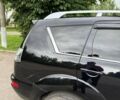 Черный Мицубиси Аутлендер, объемом двигателя 2 л и пробегом 210 тыс. км за 10700 $, фото 16 на Automoto.ua