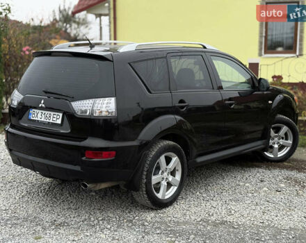 Черный Мицубиси Аутлендер, объемом двигателя 2.4 л и пробегом 184 тыс. км за 10800 $, фото 9 на Automoto.ua