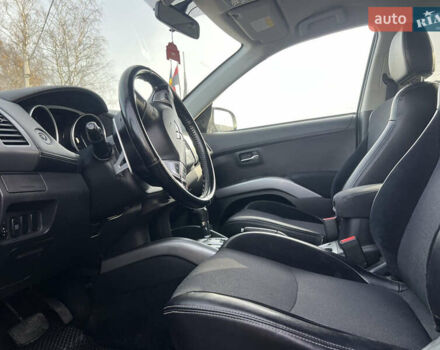 Черный Мицубиси Аутлендер, объемом двигателя 2.36 л и пробегом 244 тыс. км за 9850 $, фото 18 на Automoto.ua