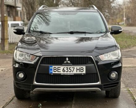 Черный Мицубиси Аутлендер, объемом двигателя 2.4 л и пробегом 197 тыс. км за 11300 $, фото 4 на Automoto.ua