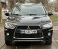 Черный Мицубиси Аутлендер, объемом двигателя 2.4 л и пробегом 197 тыс. км за 11300 $, фото 4 на Automoto.ua