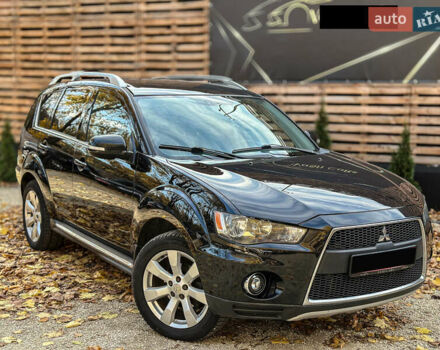 Черный Мицубиси Аутлендер, объемом двигателя 2.2 л и пробегом 226 тыс. км за 11500 $, фото 7 на Automoto.ua