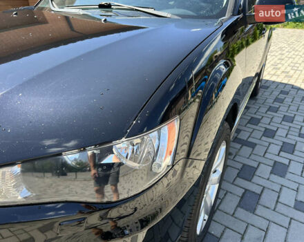 Чорний Міцубісі Аутлендер, об'ємом двигуна 2.2 л та пробігом 214 тис. км за 10600 $, фото 11 на Automoto.ua