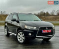 Чорний Міцубісі Аутлендер, об'ємом двигуна 2 л та пробігом 228 тис. км за 10550 $, фото 1 на Automoto.ua