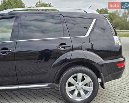 Мицубиси Аутлендер 2010 в Калуше на Automoto.ua Черный Мицубиси Аутлендер, объемом двигателя 1.97 л и пробегом 270 тыс. км за 11700 $, фото 19 на Automoto.ua