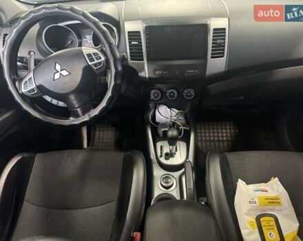 Чорний Міцубісі Аутлендер, об'ємом двигуна 2.4 л та пробігом 187 тис. км за 10200 $, фото 10 на Automoto.ua