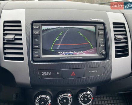 Черный Мицубиси Аутлендер, объемом двигателя 2.2 л и пробегом 227 тыс. км за 10700 $, фото 28 на Automoto.ua