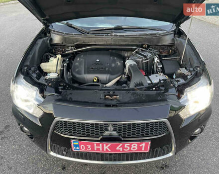 Черный Мицубиси Аутлендер, объемом двигателя 0 л и пробегом 257 тыс. км за 10399 $, фото 38 на Automoto.ua