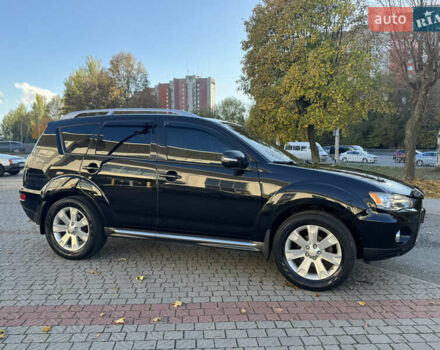 Черный Мицубиси Аутлендер, объемом двигателя 3 л и пробегом 162 тыс. км за 10800 $, фото 3 на Automoto.ua