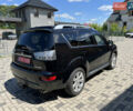 Чорний Міцубісі Аутлендер, об'ємом двигуна 2.2 л та пробігом 214 тис. км за 10600 $, фото 5 на Automoto.ua