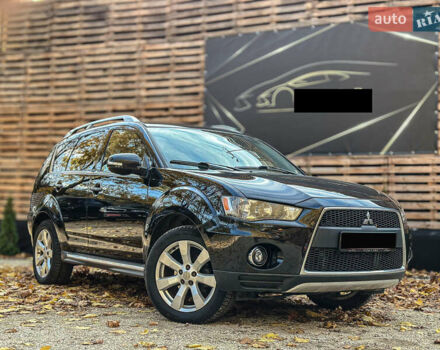 Черный Мицубиси Аутлендер, объемом двигателя 2.2 л и пробегом 226 тыс. км за 11500 $, фото 5 на Automoto.ua